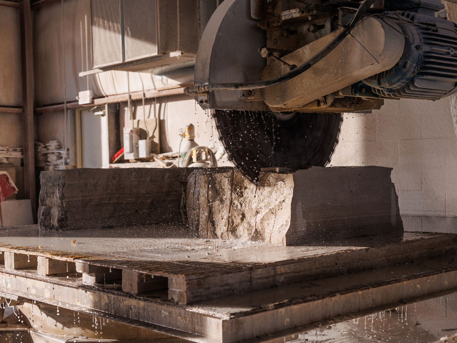 A giant wet saw cutting stone from the Rademann Stone quarry