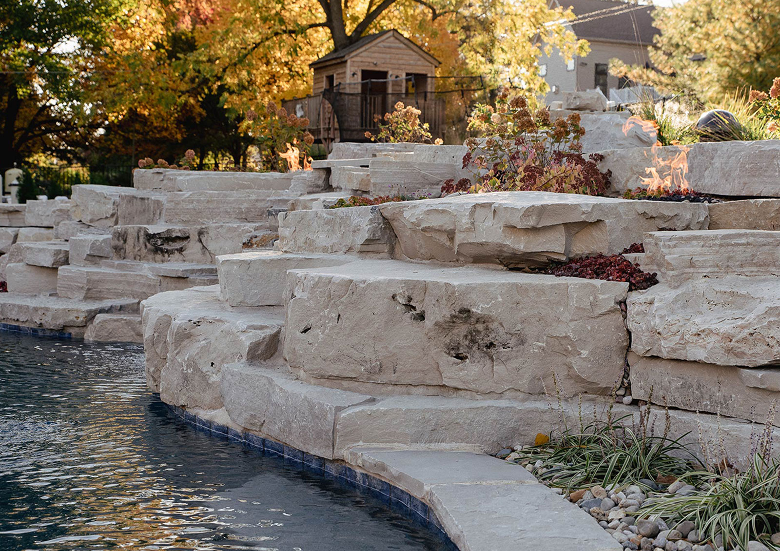 edge of a pond with Rademann landscape stone