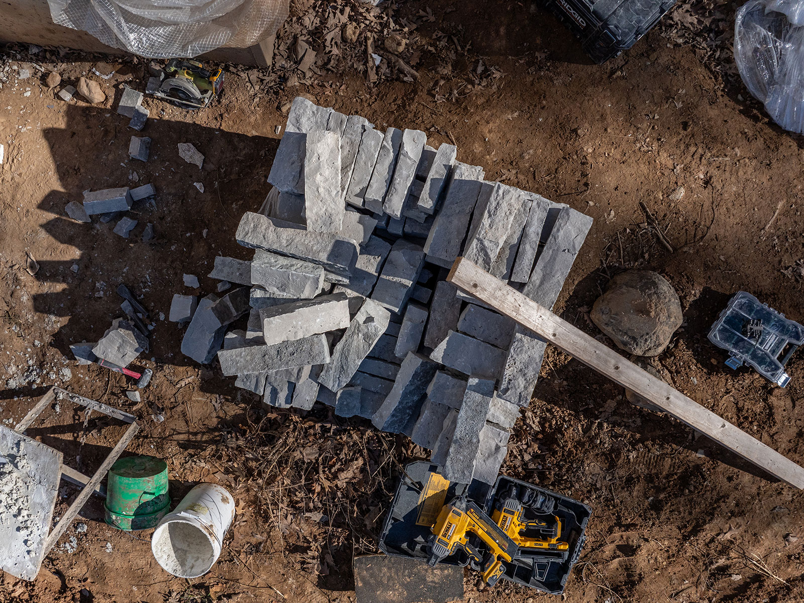 Overhead of a pile of Rademann stone veneer on a construction job site